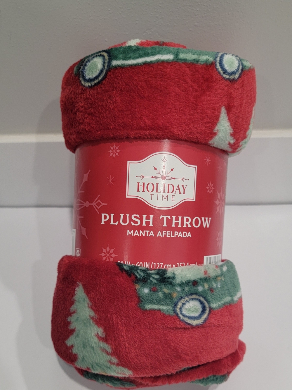 Holiday Time branded plush Christmas throw blanket featuring a festive truck